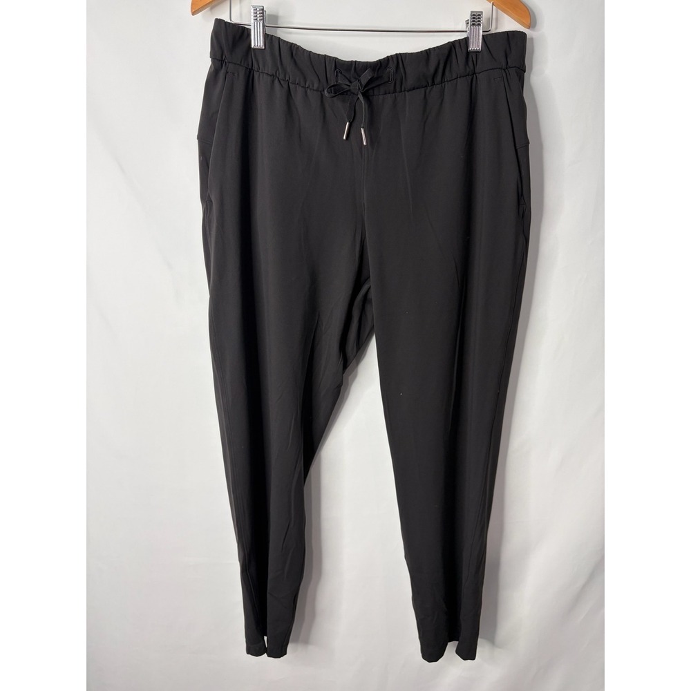 Lululemon On the Fly 7/8 Pant Black Luxtreme Jogger Sz 12 Athleisure Yoga Gym